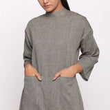 Front Detail of a Model wearing Charcoal Grey Handspun Straight Ankle Length Jumpsuit