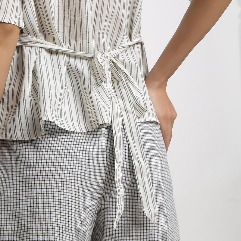 Back Detail of a Model wearing Ivory and Charcoal Striped A-line Top