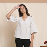 Front View of a Model wearing Cloudy Grey 100% Cotton Loose Fit V-Neck Top