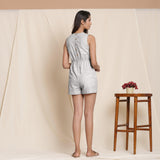 Back View of a Model wearing Striped Cloudy Grey Sleeveless Cotton Romper