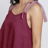 Front Detail of a Model wearing Handspun Maroon Convertible Tie-Up Top