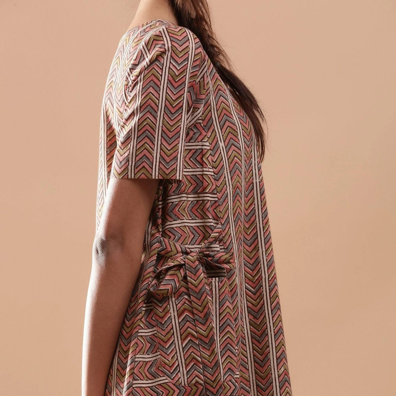 Right Detail of a Model wearing Kalamkari Chevron Striped Paneled Dress