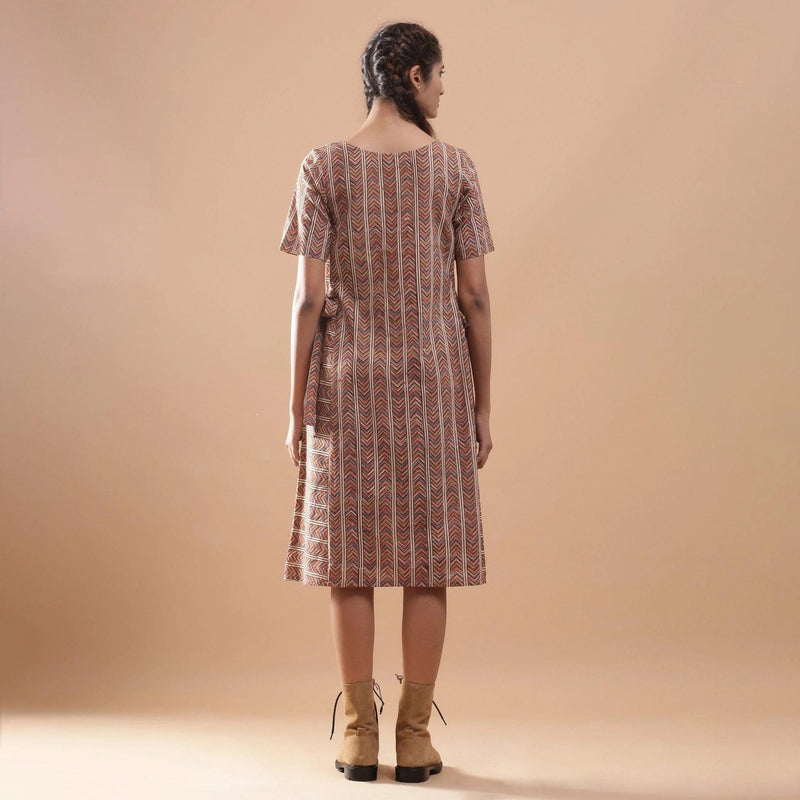 Back View of a Model wearing Kalamkari Chevron Striped Paneled Dress