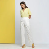 Front View of a Model wearing Cotton Schiffli White Straight Pant