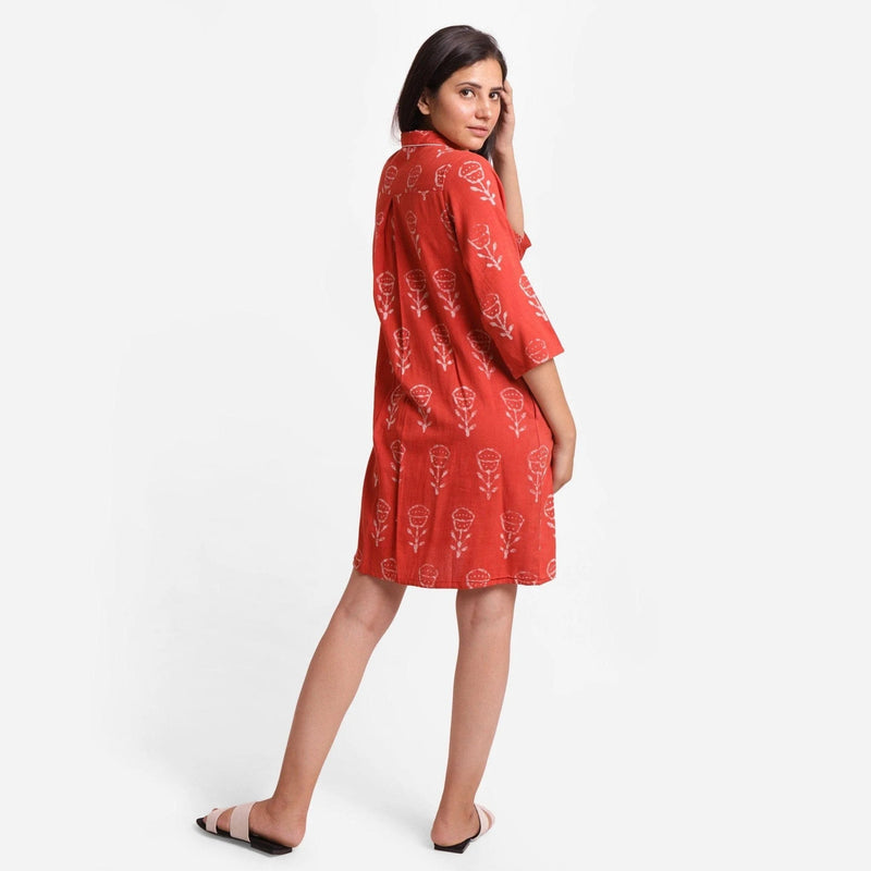 Back View of a Model wearing Dabu Hand Block Print Orange Button-Down Dress