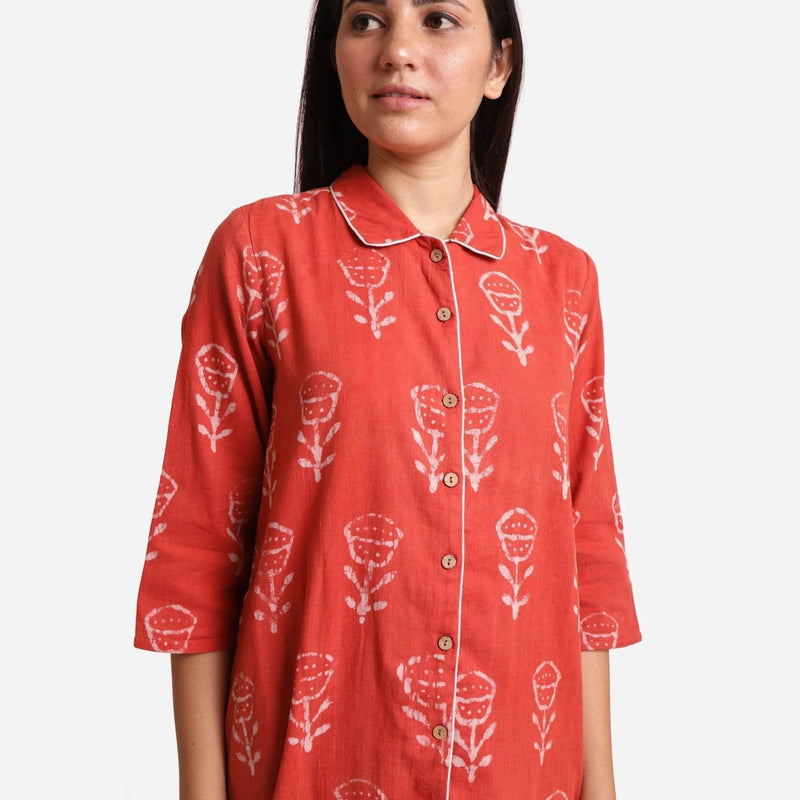 Front Detail of a Model wearing Dabu Hand Block Print Orange Button-Down Dress