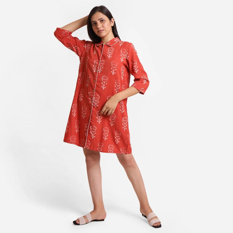 Front View of a Model wearing Dabu Hand Block Print Orange Button-Down Dress