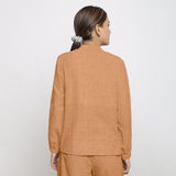 Back View of a Model wearing Desert Yellow 100% Linen Mandarin Collar Shirt