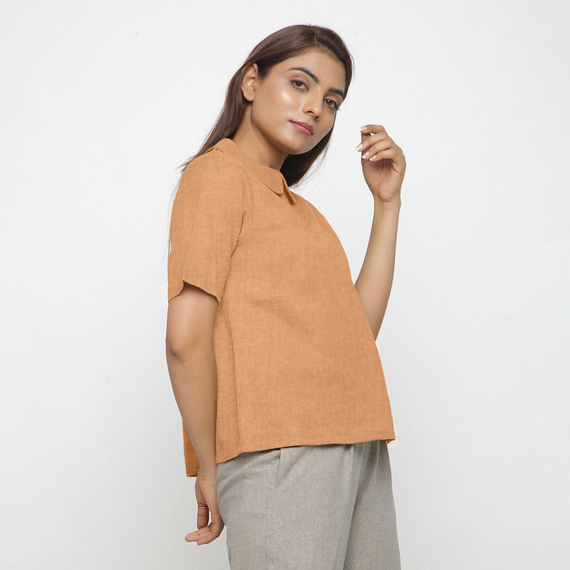 Right View of a Model wearing Desert Yellow 100% Linen Peter Pan Collar Top