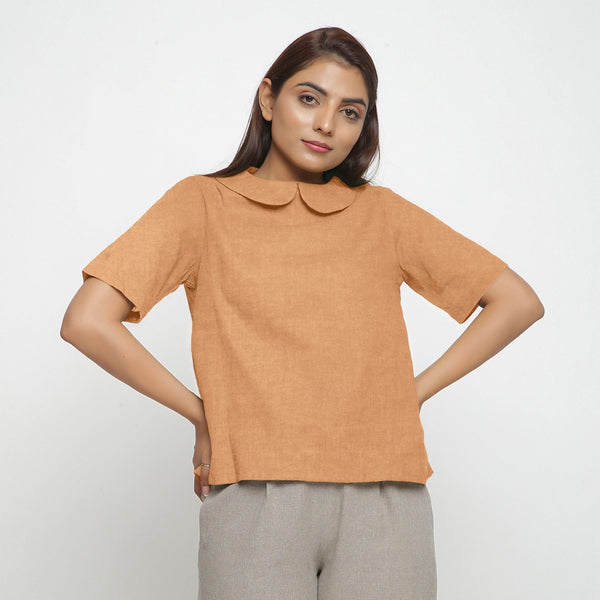 Front View of a Model wearing Desert Yellow 100% Linen Peter Pan Collar Top