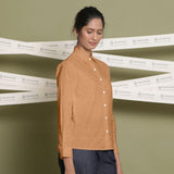 Right View of a Model wearing Desert Yellow Linen Cuff Sleeves Button-Down Shirt