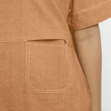 Close View of a Model wearing Desert Yellow Linen Knee Length Yoked Dress