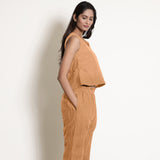 Right View of a Model wearing Desert Yellow Linen V-Neck Frilled Godet Top