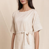 Front Detail of a Model wearing Dusk Beige Cotton Striped Sack Dress