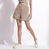 Front View of a Model wearing Dusk Beige Cotton Corduroy Baggy Shorts