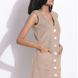 Front Detail of a Model wearing Cotton Corduroy Dusk Beige Button-Down Dress