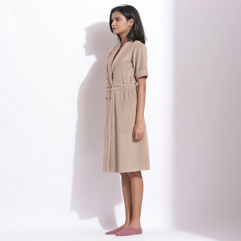 Left View of a Model wearing Cotton Corduroy Dusk Beige Coat Dress