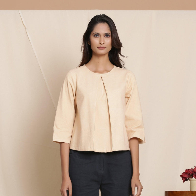 Front View of a Model wearing Dusk Beige Warm Cotton Flannel Box-Pleat Top