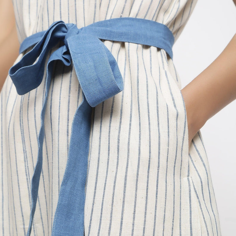 Front Detail of a Model wearing Ecru and Blue Striped Vegetable Dyed Cotton Sleeveless Jumpsuit