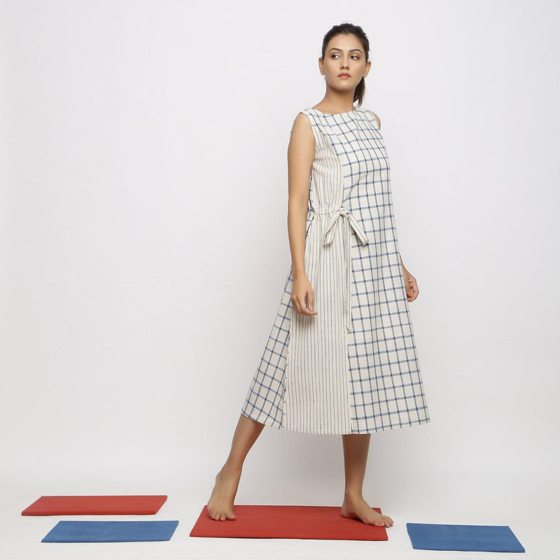 Right View of a Model wearing Vegetable Dyed Blue Checks Paneled Dress