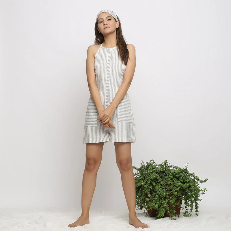 Front View of a Model wearing Ecru Handspun Cotton Halter Neck Romper