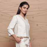 Right View of a Model wearing Undyed V Neck Jute Laced Cotton Top