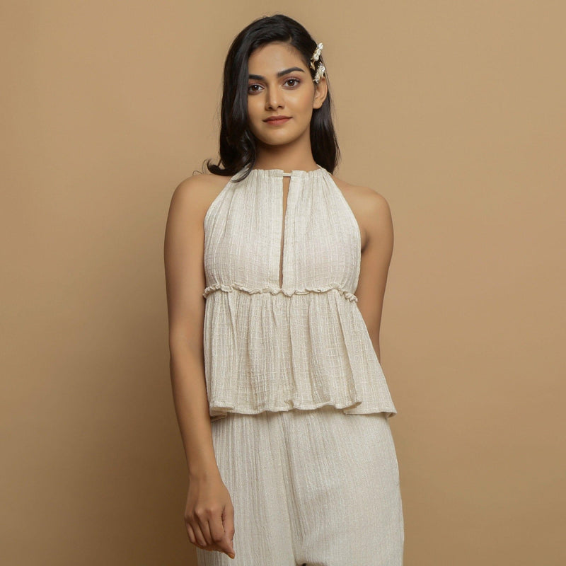 Front View of a Model wearing Ecru Cotton Flax Sleeveless Flared Top