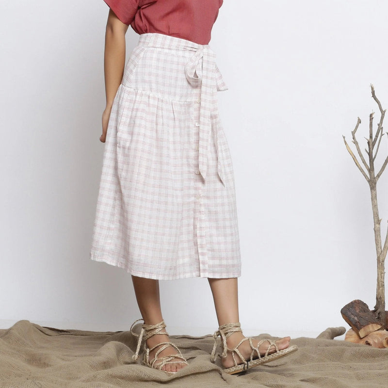 Right View of a Model wearing Ecru and Red Handspun Gathered Skirt