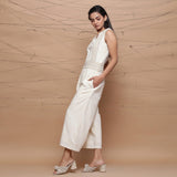 Left View of a Model wearing Handspun Ivory Jute Laced Jumpsuit