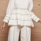 Front Detail of a Model wearing Chic Jute Laced Peplum Top and Pant Set