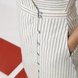 Front Detail of a Model wearing Vegetable Dyed Ecru Button-Down Dress