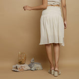 Back View of a Model wearing Undyed Cotton Flax Frilled Skirt