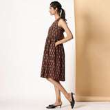 Left View of a Model wearing Floral Bagru Block Printed Gathered Dress