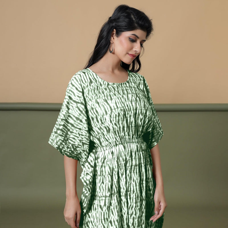 Right View of a Model wearing Dark Green Shibori Kaftan Dress