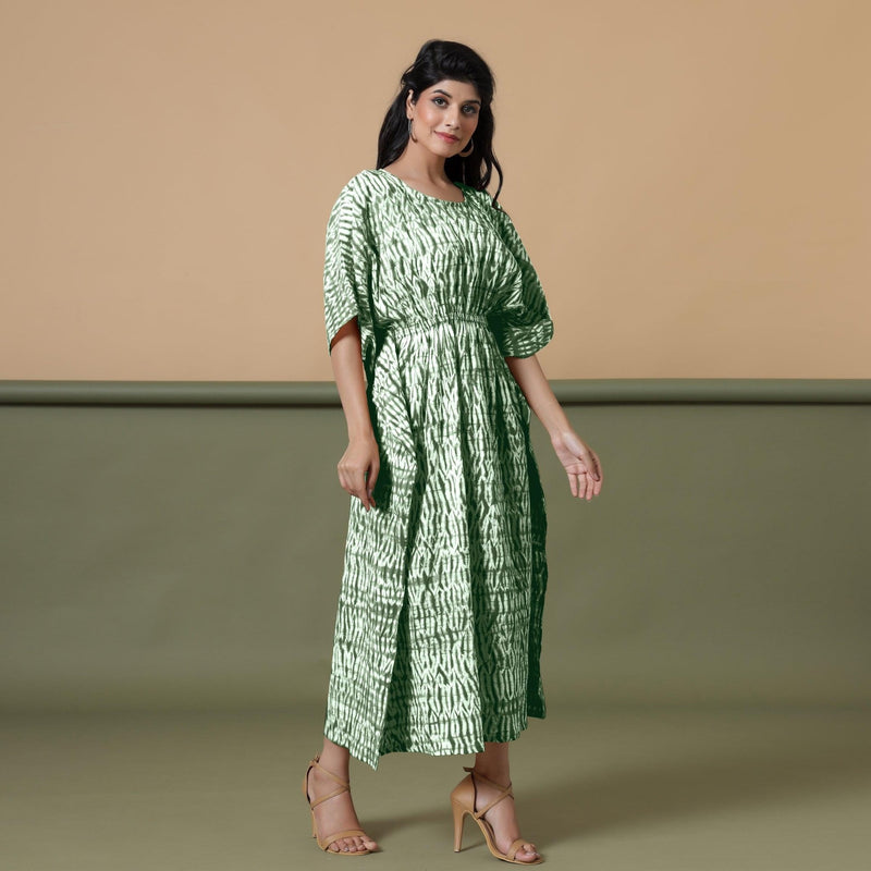 Right View of a Model wearing Dark Green Shibori Kaftan Dress