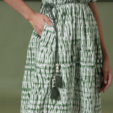 Close View of a Model wearing Fern Green Shibori Drop Shoulder Dress