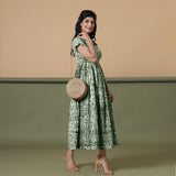 Right View of a Model wearing Dark Green Shibori Elasticated Gathered Dress