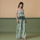 Right View of a Model wearing Fern Green Shibori Tier Camisole Top