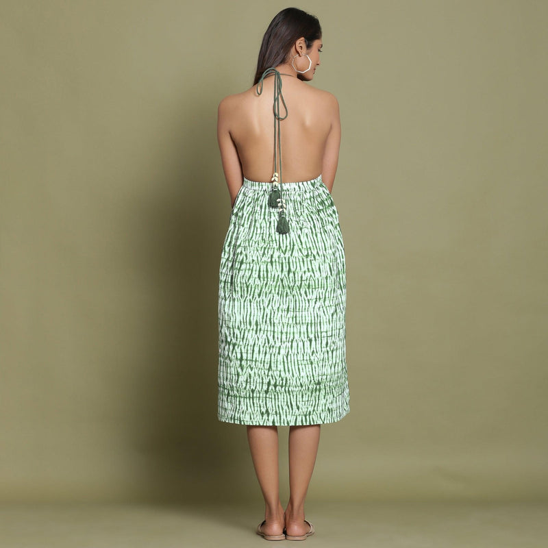 Back View of a Model wearing Dark Green Shibori Halter Neck Gathered Dress