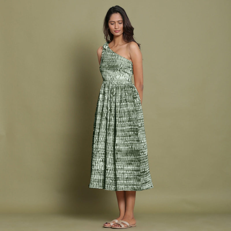 Left View of a Model wearing Dark Green Shibori One-Shoulder Midi Dress