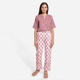 Front View of a Model wearing Fuchsia Floral Block Printed Cotton Straight Pant