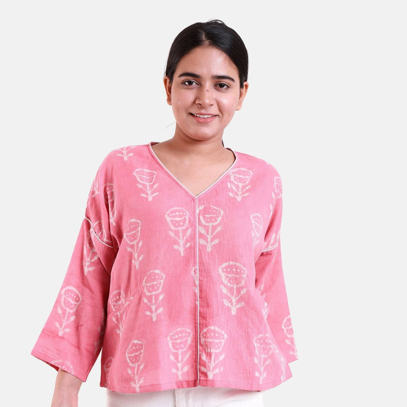 Front View of a Model wearing Fuchsia Dabu Printed V-Neck Floral Top