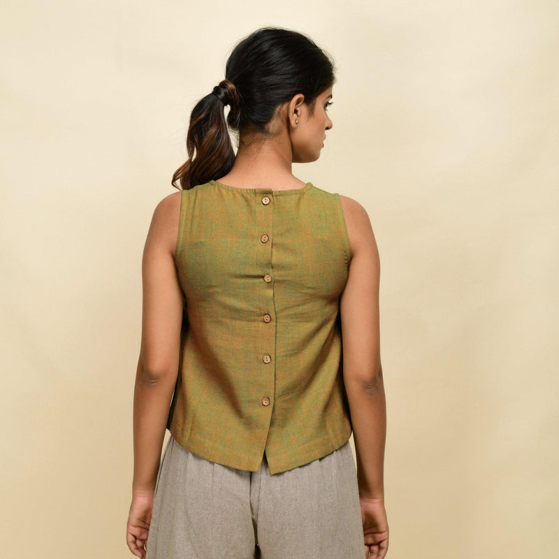 Back View of a Model wearing Gold Green Handspun Cotton Sleeveless Top