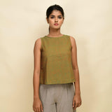 Front View of a Model wearing Gold Green Handspun Cotton Sleeveless Top