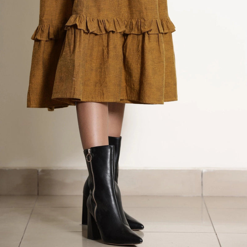 Close View of a Model wearing Golden Oak Tier Pinafore Frilled Dress