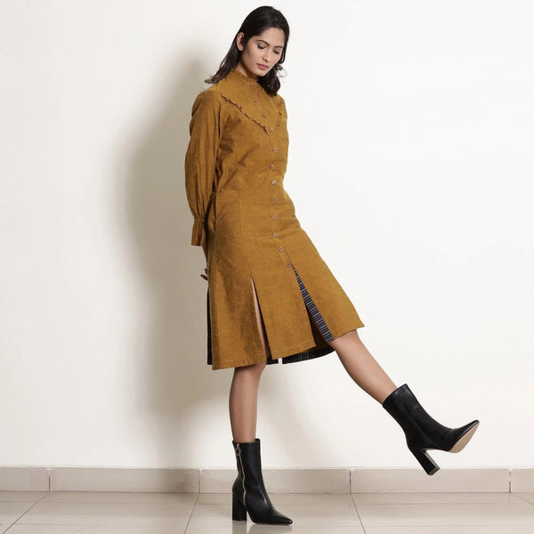 Right View of a Model wearing Golden Oak Warm Cotton Frilled Knee Length Dress