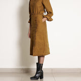 Left View of a Model wearing Warm Golden Oak A-Line Frilled Skirt