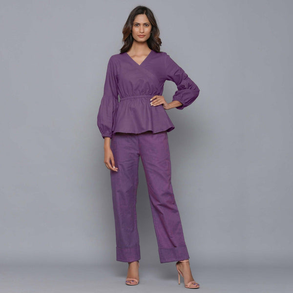 Front View of a Model wearing Grape Wine Peplum Top and Straight Pant Set