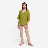 Front View of a Model wearing Green Loose Fit Drop Shoulder Top