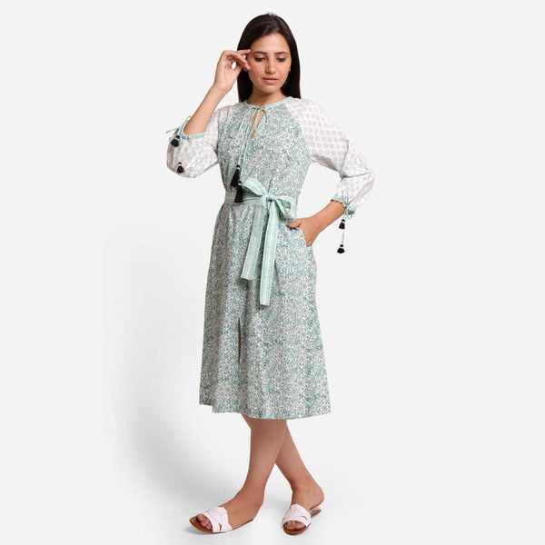 Front View of a Model wearing Green Block Print Cotton Peasant Midi Dress